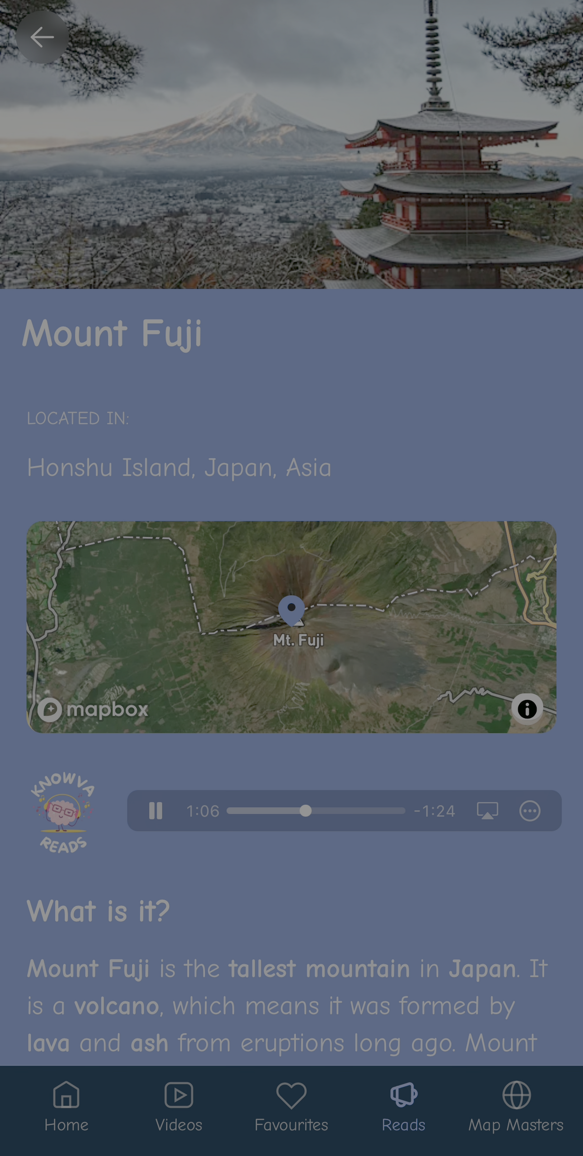 A screenshot of the Knowva app running on a mobile phone. It shows Mount Fuji in Japan, with the Knowva Reads audio player featured in the centre.