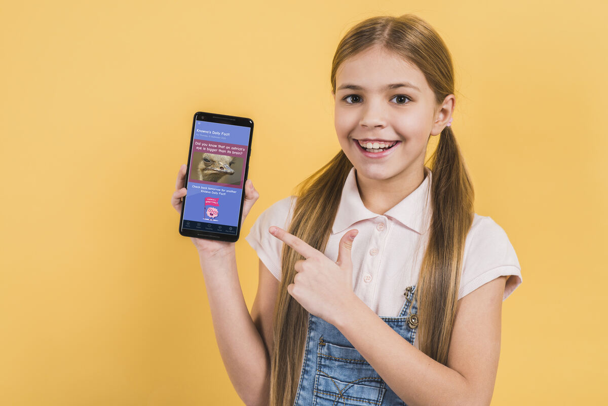 Illustration of a child using Knowva's Daily Fact on a mobile phone.