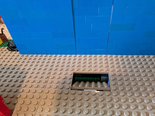 Resetting the trap door